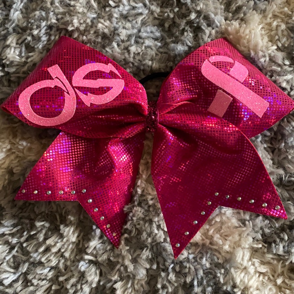 Cheer bow. Dark oil with shimmer and rhinestones